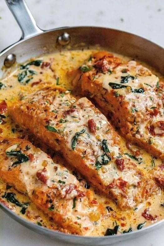 Creamy Tuscan Garlic Salmon with Spinach and Sun-Dried Tomatoes Creamy Tuscan Garlic Salmon with Spinach and Sun-Dried Tomatoes